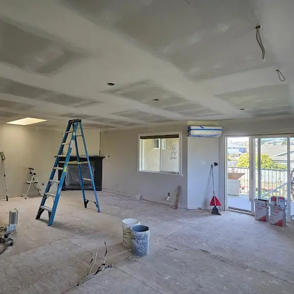 Empty room under renovation with ladder