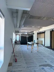 Empty room under renovation with tools